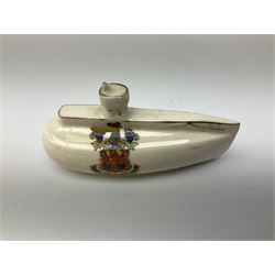 Three pieces of crested ware, comprising grenade detailed 'The Mills Hand Grenade' with Filey Crest, marked beneath Grafton China, a cannon with crest banner detailed 'Sterlini Oppidvm', marked beneath W H Goss, and a submarine with Tunbridge Wells crest, marked beneath Arcadian China 