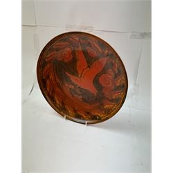 William Salter Mycock (1872-1950) for Pilkington's Royal Lancastrian, orange charger decorated with a bird in flight, D29cm