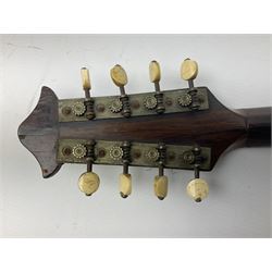 Italian mandolin, with foliate inlaid scratchplate, paper label inscribed 'Carlo Loveri & Figlio of Napoli', L62cm