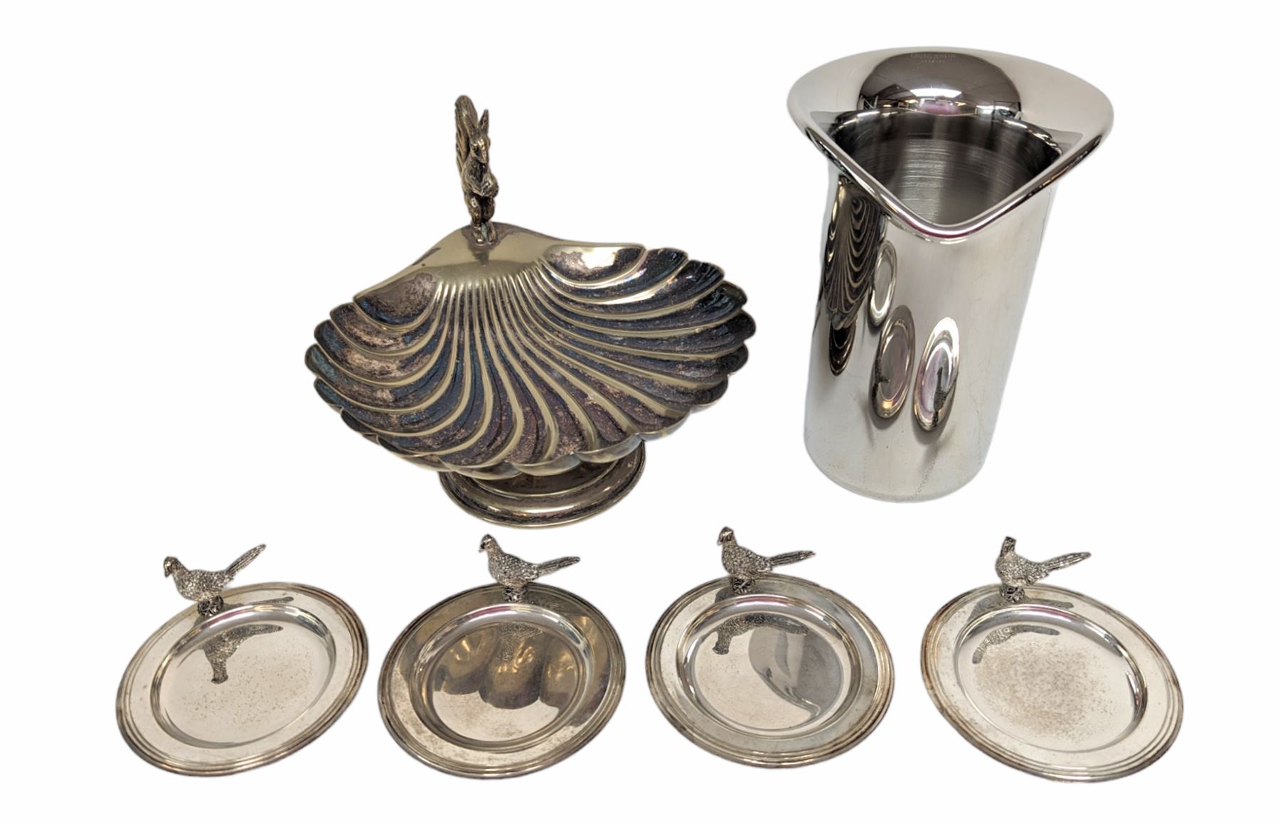 George Jensen stainless steel wine cooler, together with a silver plated pedestal dish, in the form of a clam shell and with squirrel decoration and four silver plated trinket dishes with applied pheasant decoration