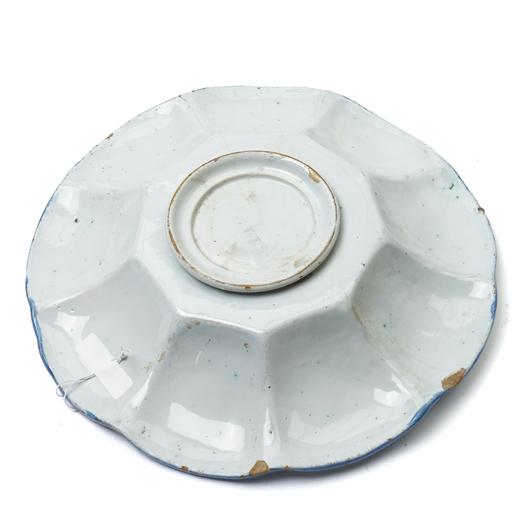 Early 18th century Frankfurt tin glazed earthenware shallow dish decorated in blue with panels of Chinese figures and landscapes D34cm