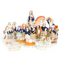 Group of Staffordshire figures, mostly Highland examples, to include figure with bagpipes ...
