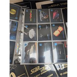 Star Trek collectables, including Danbury Mint '22ct Gold Card Collection', PCS Stamps and Coins Official US Postage Celebrating The Original Star Trek Series, Star Trek St Vincent and Grenadines first day cover collection, four stamp sets and a framed set of similar stamps, commemorative coins, Star Trek The Experience Las Vegas coin, three commemorative 'gold stamps' and three albums of collectors cards and telephone cards