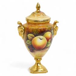 Coalport two handled vase & cover, hand painted with fruit by Manfred Pinter with gilt ram...
