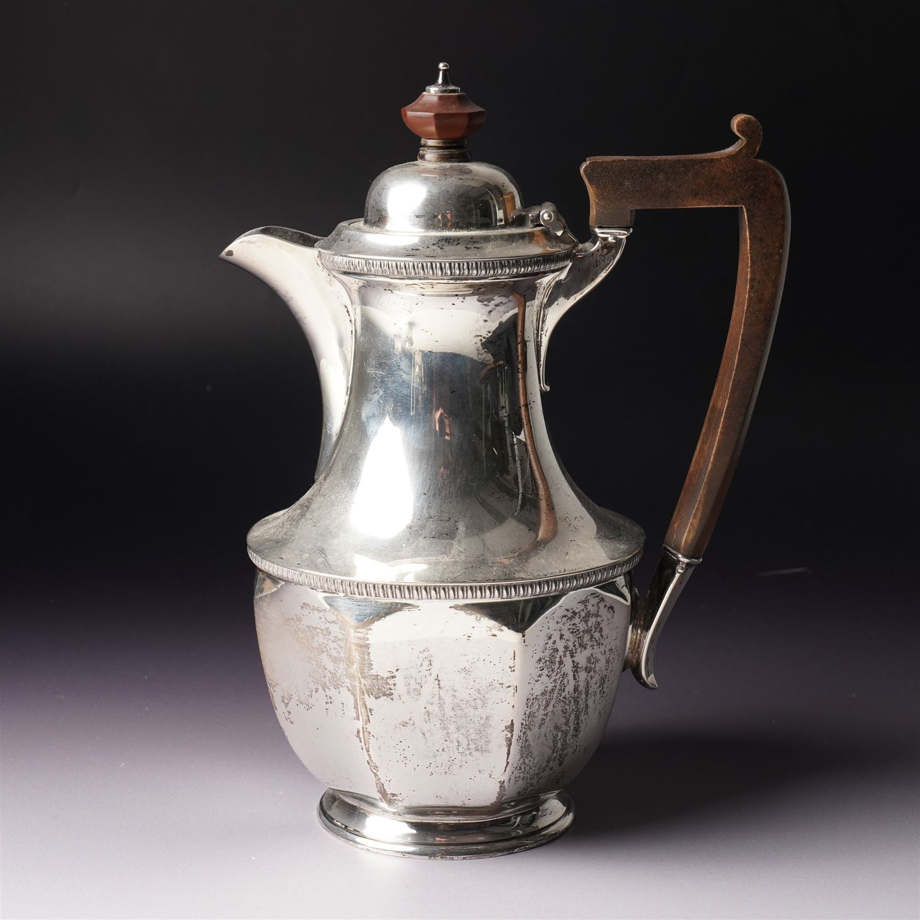  Silver tea set comprising teapot, hot water jug, sugar bowl and milk jug of circular panel sided design Sheffield 1941 Maker Harrison Brothers & Howson 