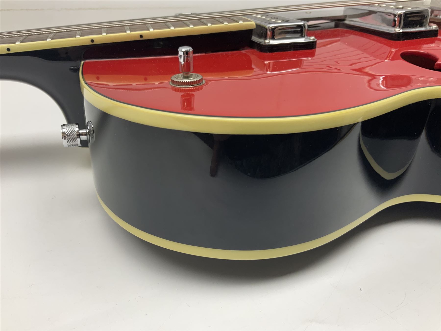 Gretsch Electromatic semi-acoustic guitar model G5129 in black and red with Bigsby tremolo, serial no.KS05063904; L105cm; in fitted hard carrying case