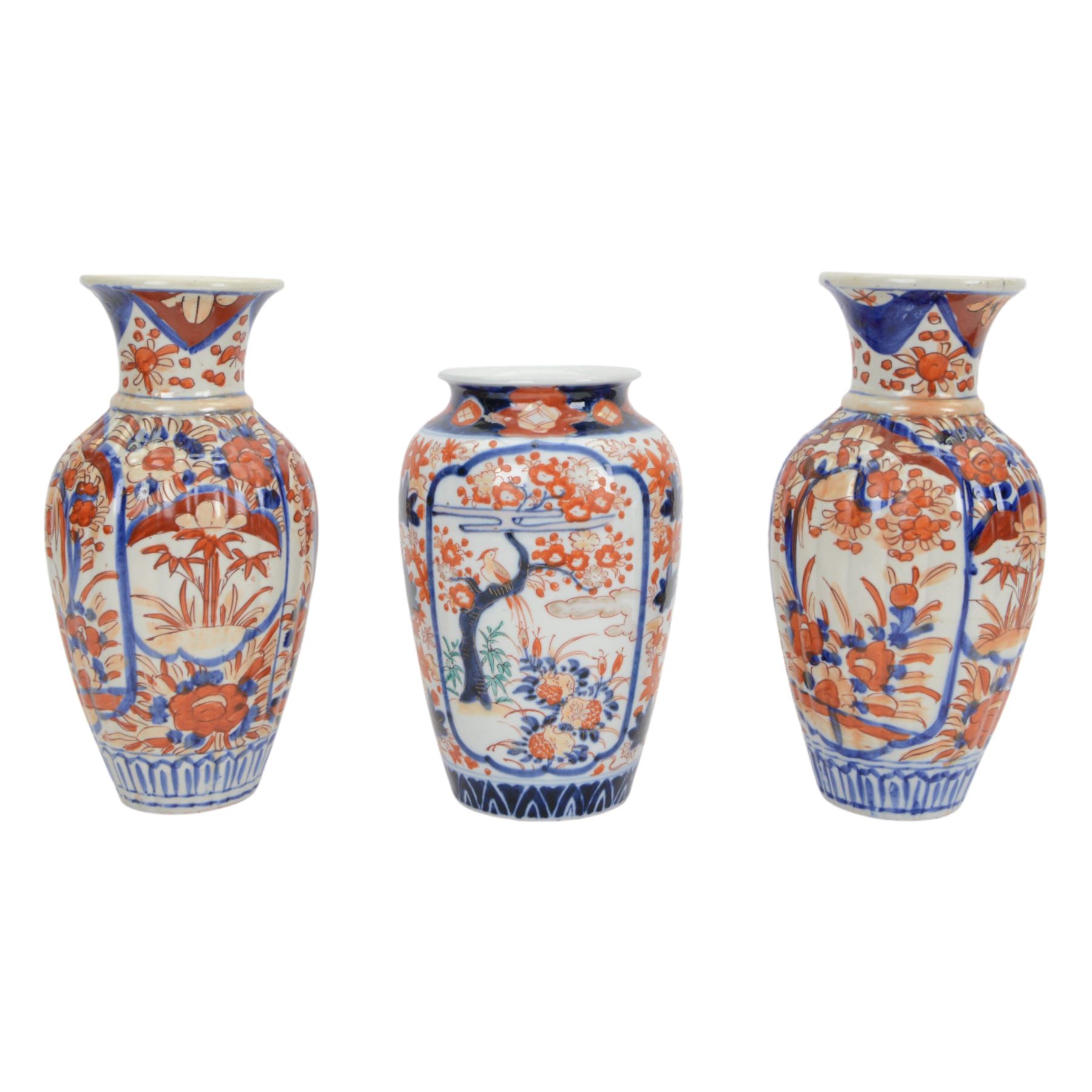 Japanese Imari dish, with scalloped edge, the internal decoration with panels of blossoming branches and a central bird, together with another imari bowl and three vases, scalloped dish H7cm