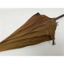 Edwardian novelty parasol by Briggs of London, the bamboo shaft with brown fabric canopy, and silver mounted terminal concealing a silver mounted pencil, hallmarked Charles Henry Dumenil, London 1904, also marked Briggs, H93cm