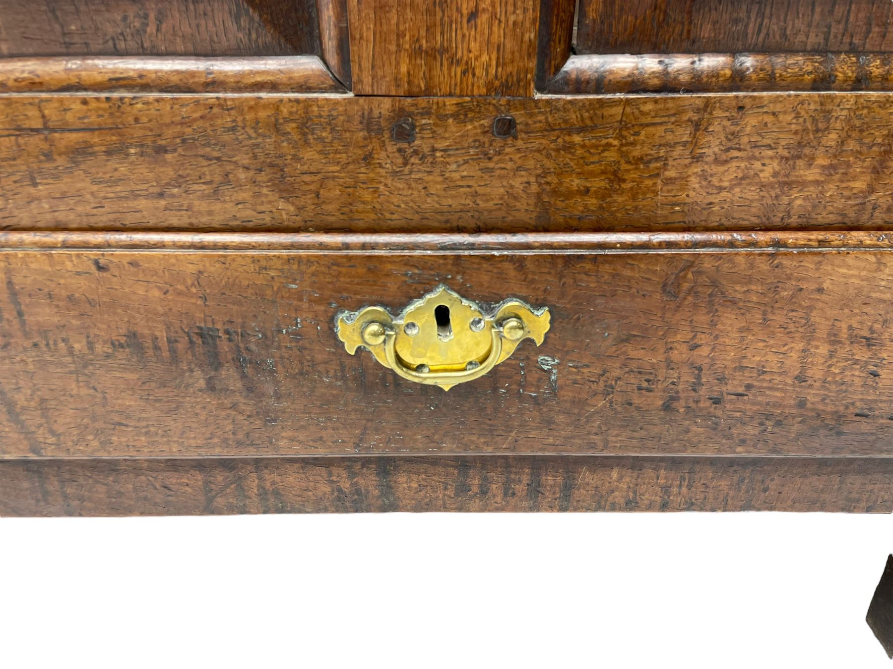 Georgian oak mule chest, moulded rectangular hinged lid over quadruple fielded panel front, the frieze inscribed '17 A Y 57', fitted with two drawers, panelled ends and back, on stile supports