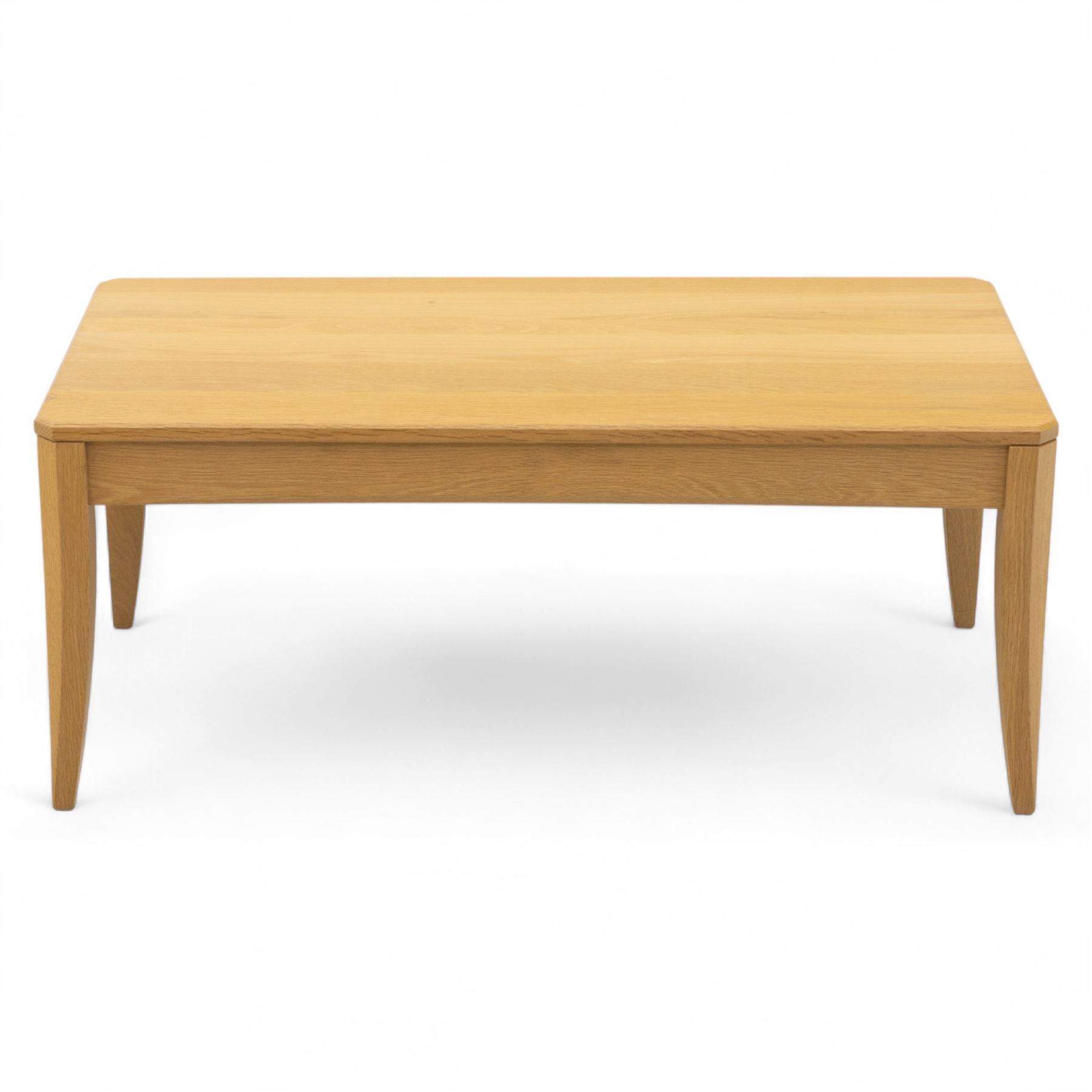 Ercol - light oak ‘Artisan’ coffee table, of rectangular form with chamfered top and gently tapered legs