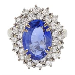 18ct white gold oval sapphire and round brilliant cut diamond cluster ring, Sheffield 2000, sapphire approx 3.75 carat, total diamond weight approx 0.70 carat