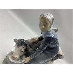 Lladro figure Eskimo Riders no 5353, two Royal Copenhagen figures, girl with calf, no 779 and girl with goose no 528, all with printed marks beneath, Lladro H18cm 