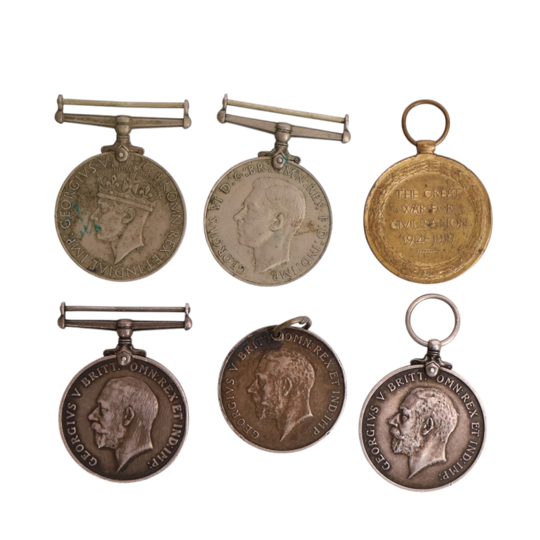 WWI British medal set, comprising George V Royal Fleet Reserve Long Service medal, War medal and Victory medal, awarded to J. 47087 T. Sharpe A.B.R.N, together with another WWI War medal, two WWII Defence medals and two sweetheart badges  