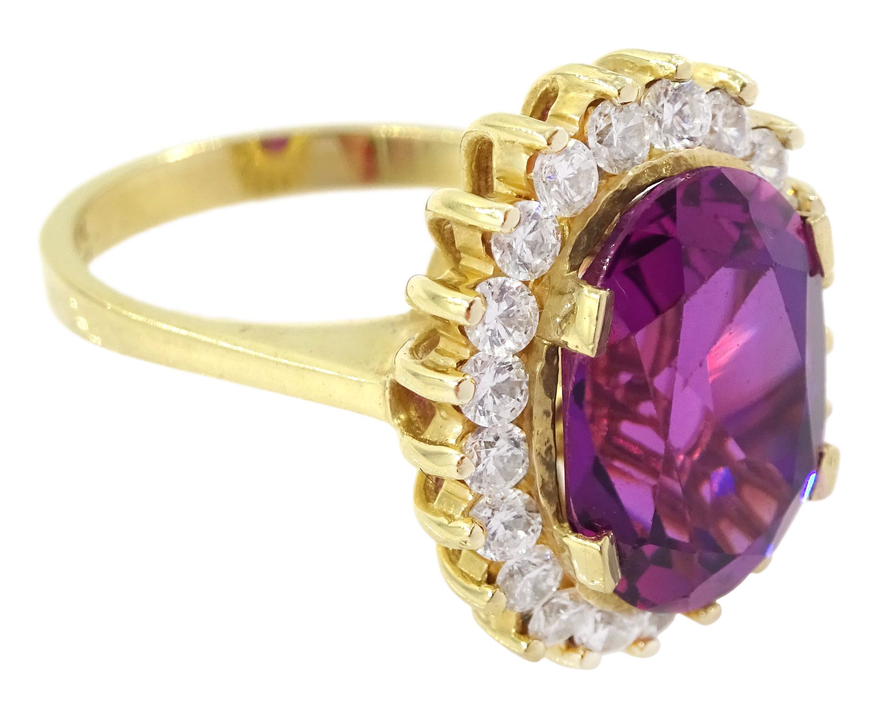 14ct gold synthetic purple sapphire and cubic zirconia cluster ring, stamped 14K