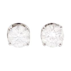 Pair of 18ct white gold round brilliant cut diamond screw back stud earrings, total diamond weight approx 0.75 carat