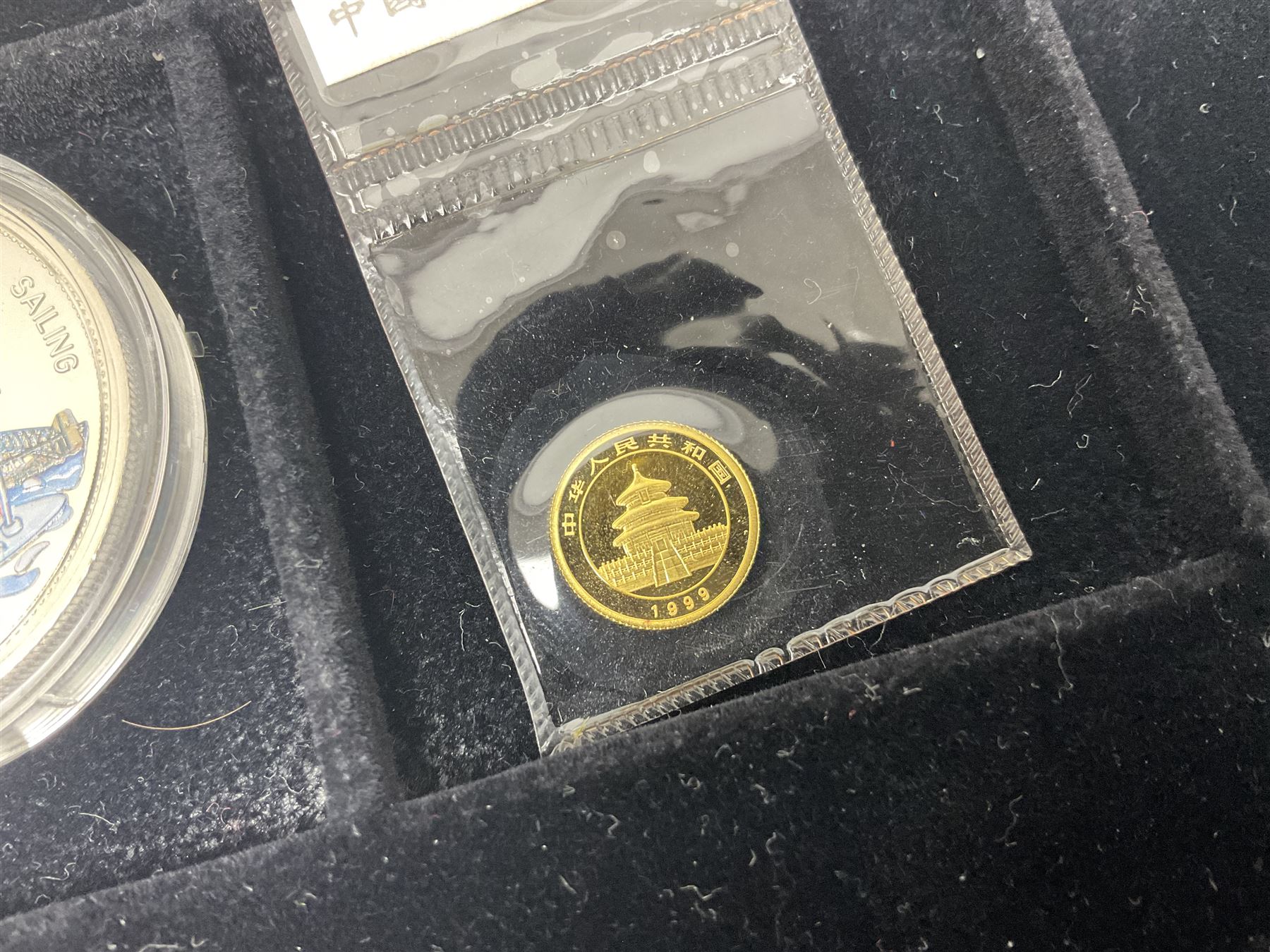 Single owner lifetime collection of mostly commemorative modern World coins with gold, silver and base metal examples, including two Queen Elizabeth II Bailiwick of Guernsey twenty-five pound gold coins 'The 1999 Royal Wedding' and '100th Anniversary of the End of the Victorian Era' 2001 each in 24 carat gold weighing 7.81 grams with certificates, silver coins commemorating the Millennium 2000 including Guyana sterling silver proof two-thousand dollars, Fiji sterling silver proof five dollars etc, silver coins from the Queen Elizabeth II Golden Jubilee Collection dated either 2002 or 2003 from Great Britain and the Commonwealth countries, United Kingdom commemorative crowns in card folders, The Royal Mint United Kingdom 1997 proof coin set in red folder without certificate etc