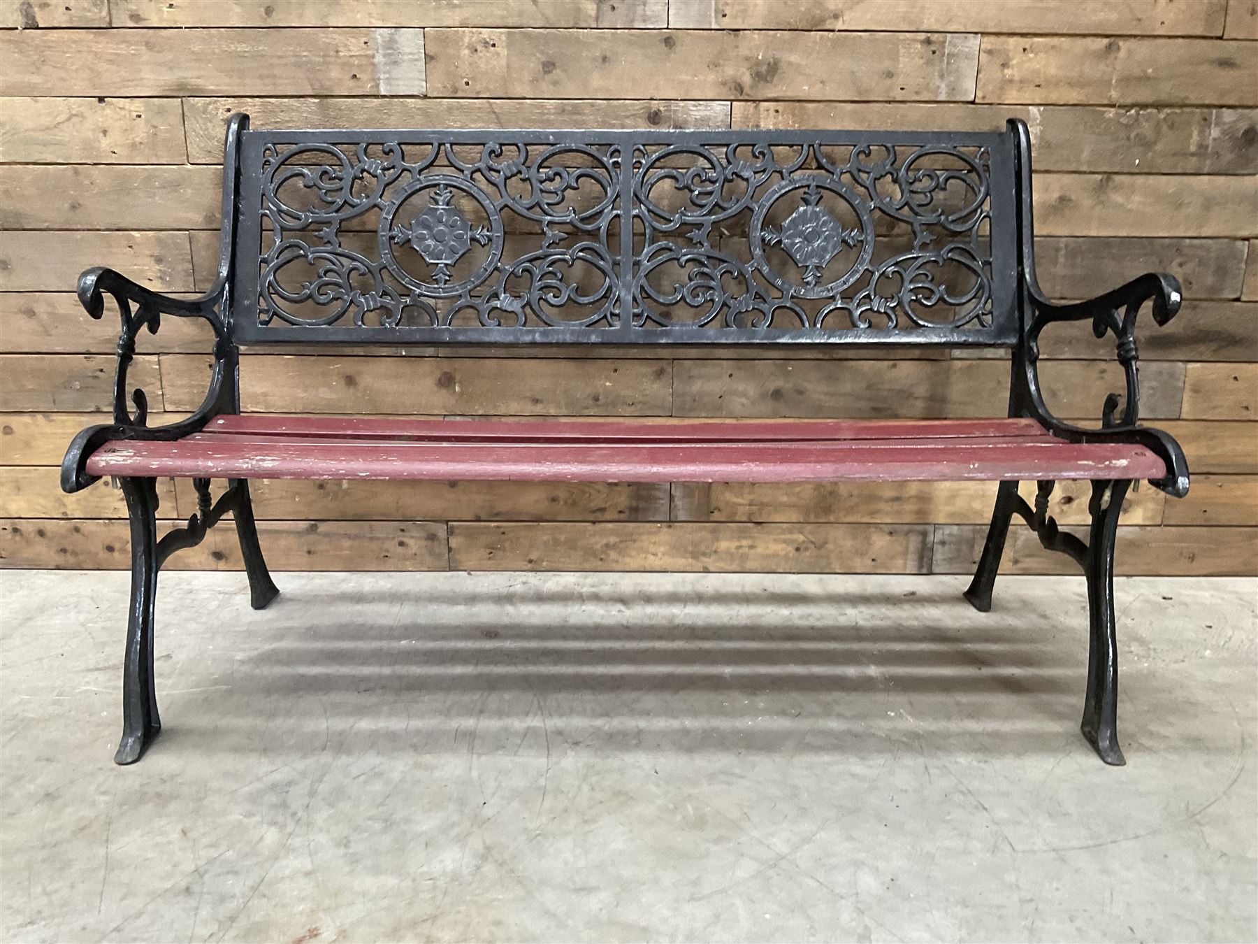 Cast iron and wood slatted garden bench