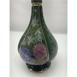 Royal Worcester vase of baluster form with floral decoration on a green ground H26cm