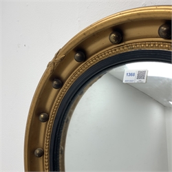 *20th century circular gilt wall mirror with convex glass, moulded black lacquered slip and mounted ball surround, D53cxm