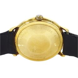 Bueche-Girod gentleman's 18ct gold automatic wristwatch, Ref. YG 11610-01, champagne dial with baton hour markers and date aperture, stamped 750 with Helvetia hallmark, on black leather strap
