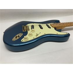 Fender Stratocaster style electric guitar in metallic blue with Rio Grande pick-ups and Fender back-plate L98cm; in Fender soft carrying case