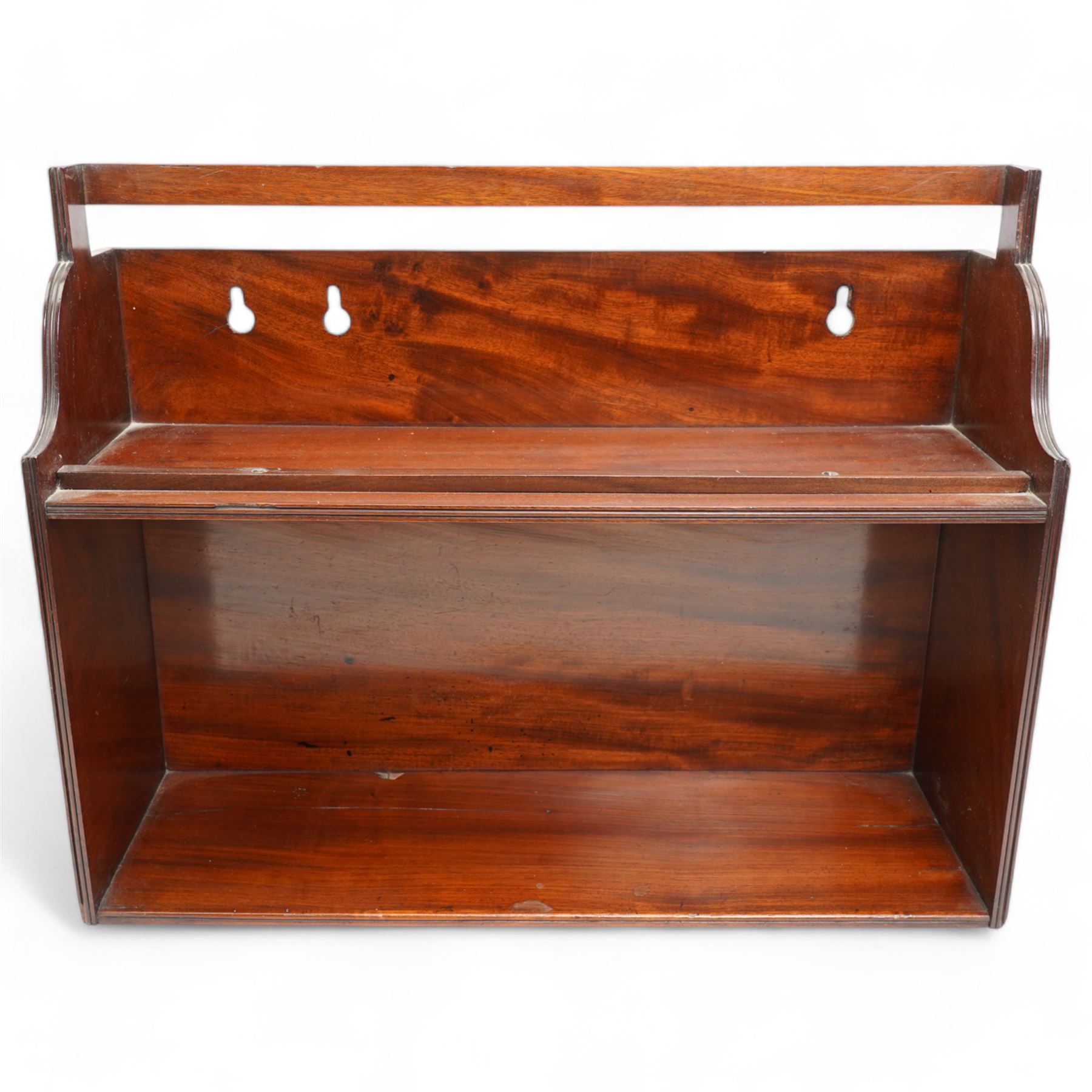 Mahogany two-tier book carrier, of rectangular section, with a single carrying handle over a shaped gallery 