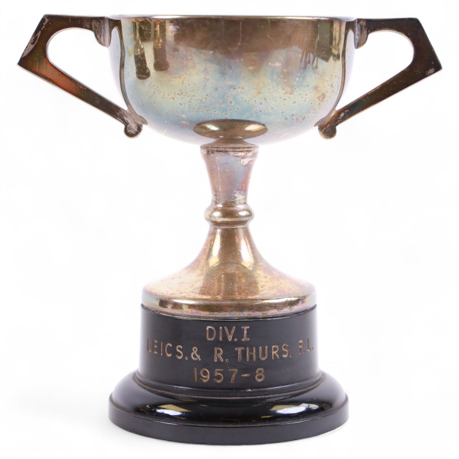 Six 1950s Leicester & Rutland Football League and Challenge Cup  silver plated trophy cups and plaques, from the estate of former Leicester City player Colin Appleton, largest H18cm