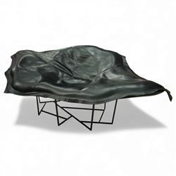 Poliform - ‘Wallace’ armchair, sculptural leaf-form silhouette upholstered in black leather, raised on triangular metal supports