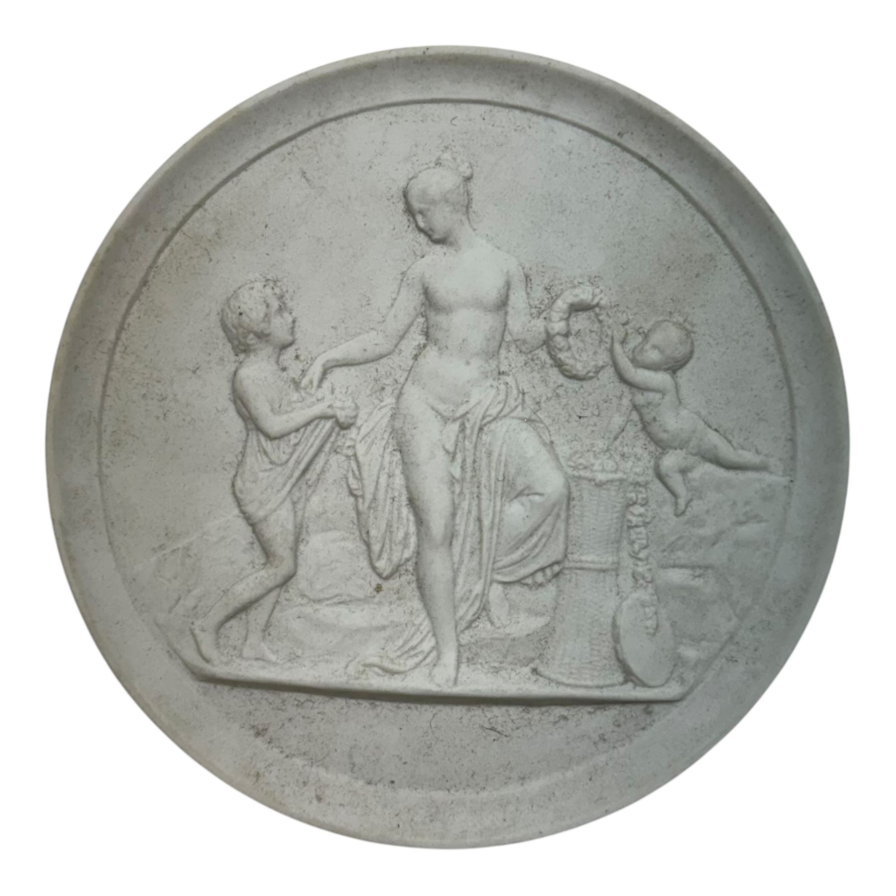 Seven plaster medallions within a wooden frame, together with another framed medallion, pair of Royal Copenhagen bisque porcelain circular plaques and two other plaques  