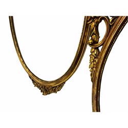 Pair oval gilt wall mirrors, the frames decorated with foliate scrolls and flower heads 