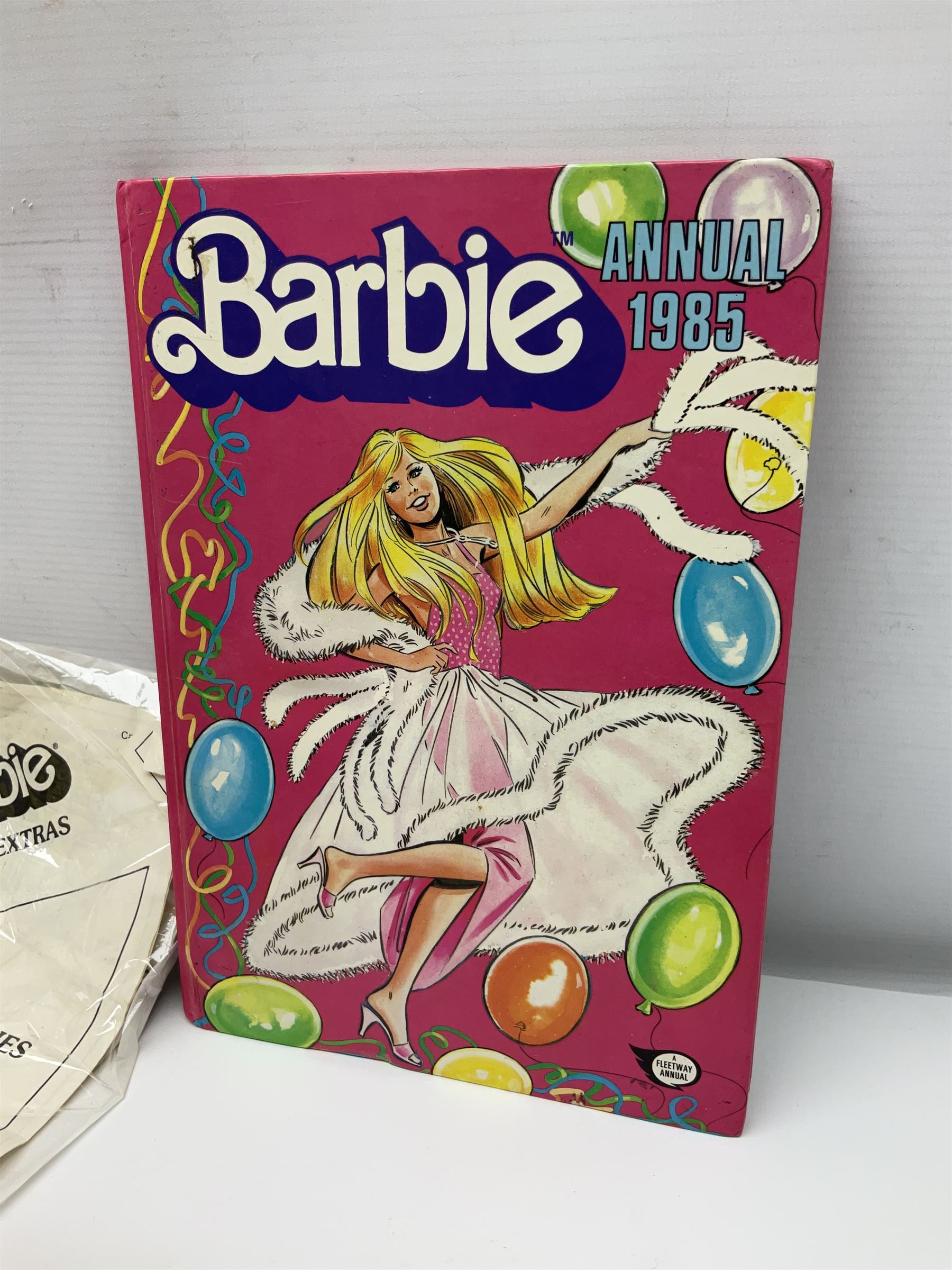 Barbie - collection of 1980s accessories including furniture and outside effects, Fluff the kitten, baby's high chair, playset and nursery items, groceries, crockery, pots and pans, homewares, television, 1985 Annual, transistor radio etc; all unboxed