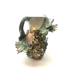  Studio pottery vase with raised entwined dragon decoration amongst foliage, impressed seal S.M, H32cm  
