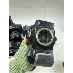 Six Minolta Dynax SLR camera bodies, comprising 800si serial no. 62703606, three 7xi examples, including one boxed example, serial nos. 20106944, 16123311 & 22107553, and two 9xi examples, serial no. 18209901 & 18202113, with three Minolta lenses, including Zoom xi 28-105mm 1:3.5(22)-4.5 lens, AF Zoom 28-85mm 1:3.5 (22)-4.5 lens and an AF Zoom 75-300mm 1:4.5(32)-5.6 lens, Hama carry case and other accessories