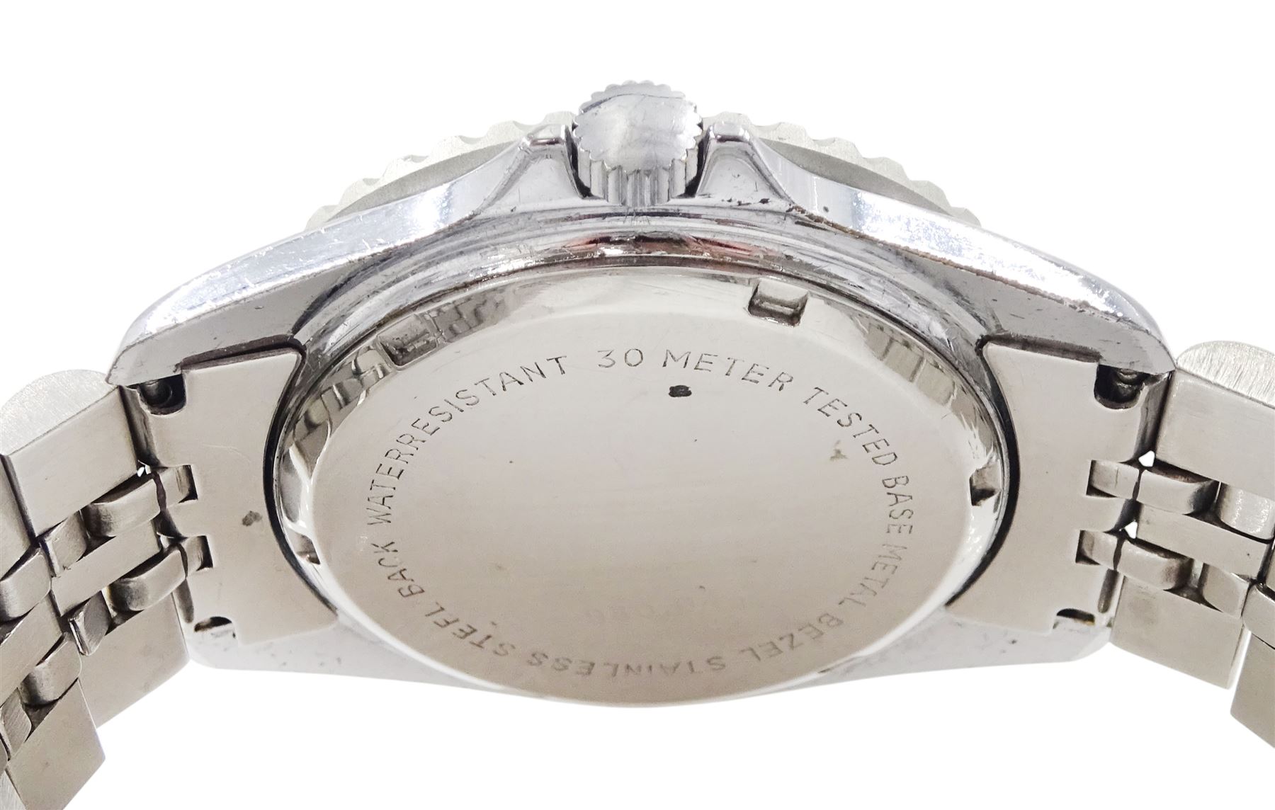 Heuer Professional gentleman's stainless steel quartz wristwatch, Ref. 980.043, black dial with luminous Arabic hour markers and date aperture, on stainless steel bracelet, with fold-over clasp