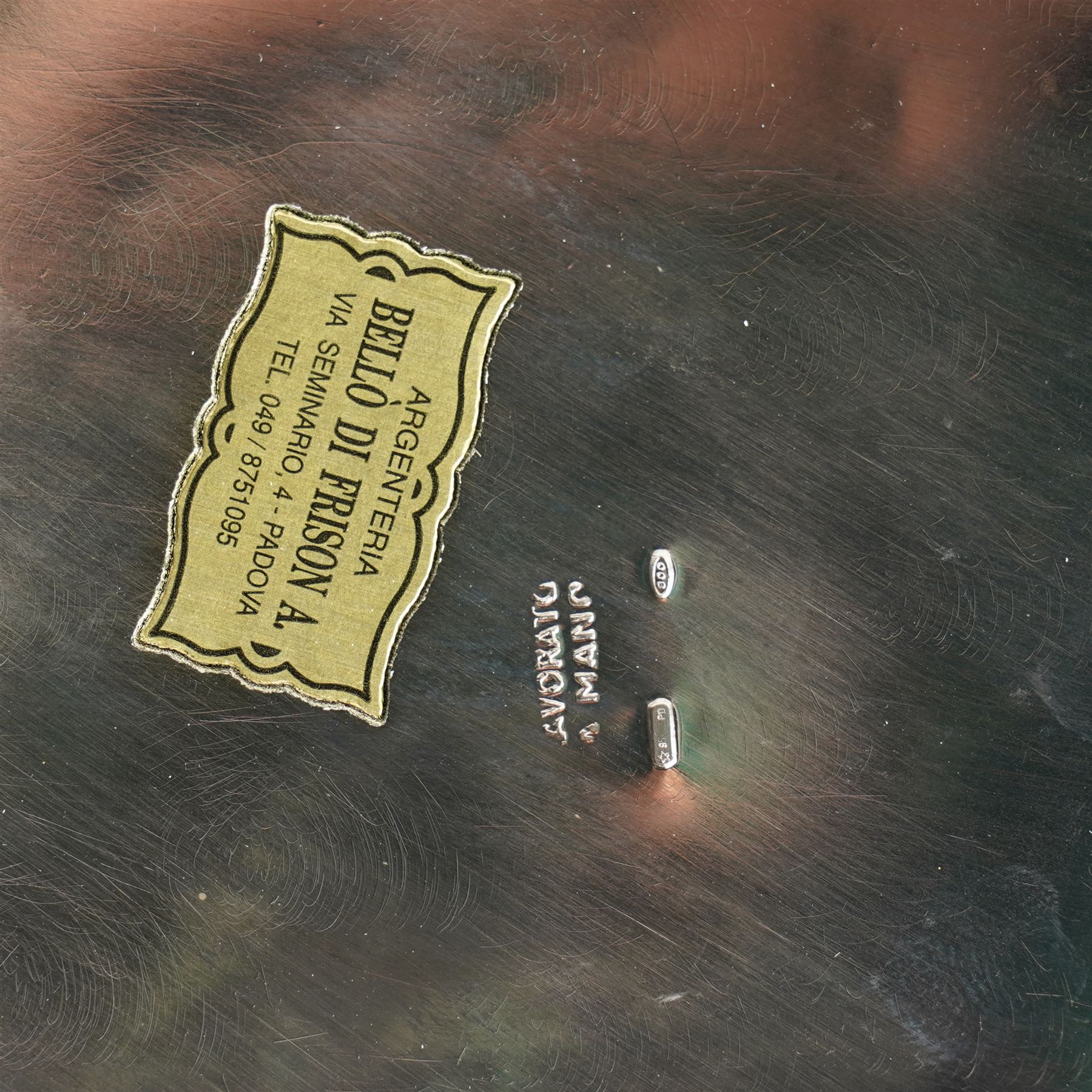 Italian 800 standard planished silver water jug of panel sided design with scroll handle  H14.5cm retailers label Bello di Frison, Padova