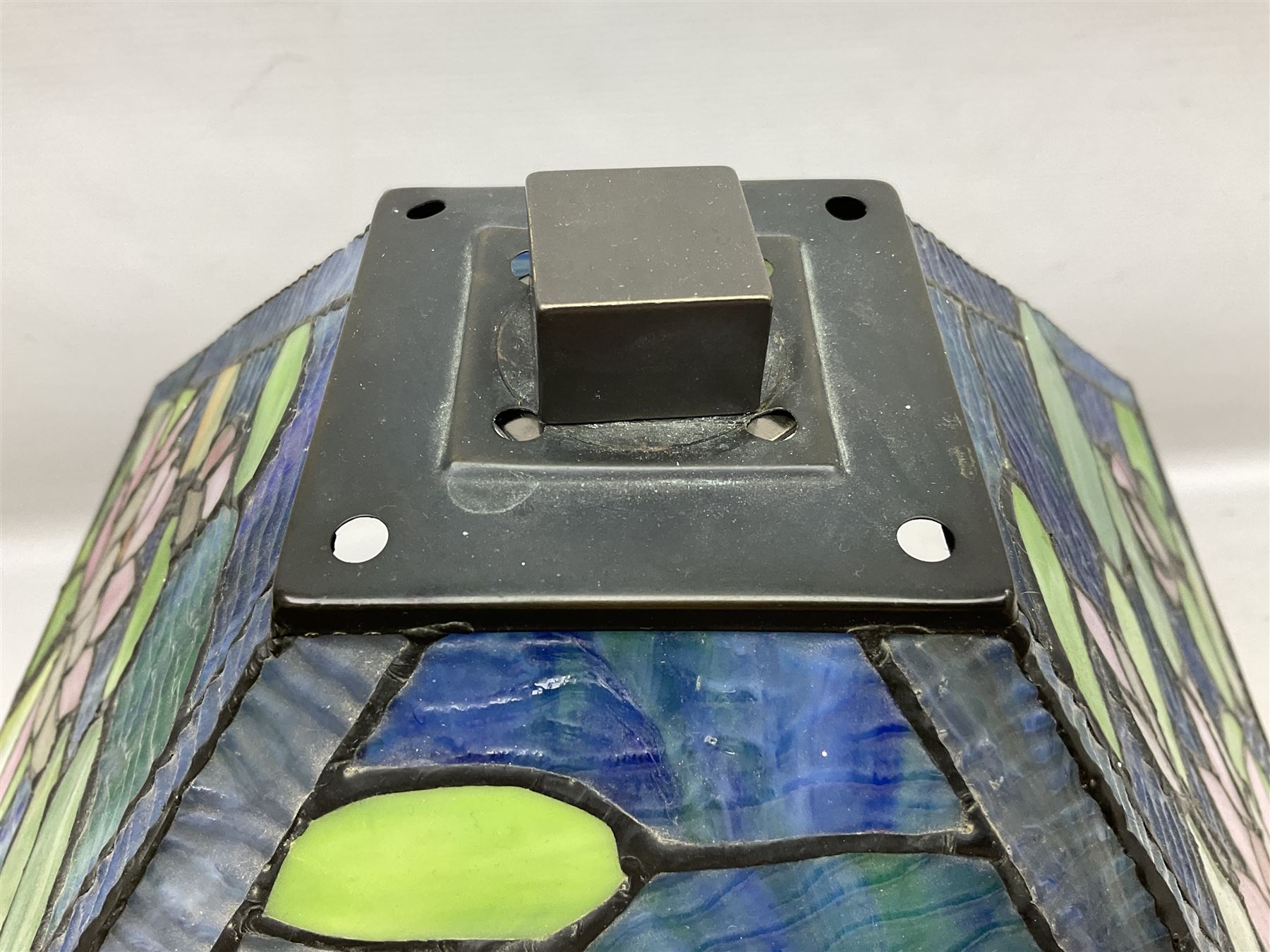 Tiffany Pond Lily style table lamp and shade with leaded panels of green, pink and rippled blue water effect ground, raised upon brushed metal base, H50cm