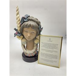Lladro figure, Holiday Glow, modelled as a bust donning headpiece of holly, baubles and candles, on mahogany base, limited edition 168/1500, sculpted by José Puche, with original box, no 2249, year issued 1993, year retired 1997, with framed warranty of authenticity and letters, H30cm