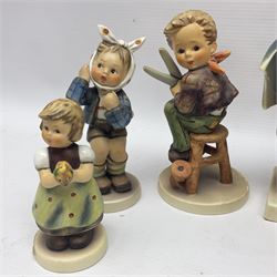 Sixteen Goebel Hummel figures, including Charlot A Young Man's Fancy, Stormy Weather and Bookworm, all with impressed and printed marks beneath