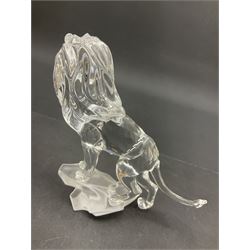 Swarovski Crystal animals, comprising camel and lion, both upon frosted crystal bases, together with Swarovski Crystal palm tree, upon similar frosted crystal base, tallest H14cm