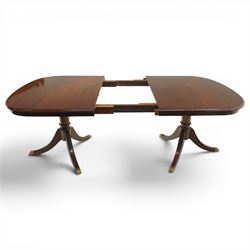Georgian design mahogany twin pedestal extending dining table, rectangular rounded top on twin tripod pedestals with splayed supports, with additional leaf (W170cm D115cm H77cm); with set six (4+2) matching mahogany framed cameo-back dining chairs, upholstered in pale yellow lozenge patterned fabric (W57cm H94cm)