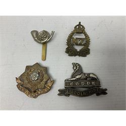 South African Army Orange Free State Artillery badge; three Commonwealth badges; and twelve Yorkshire/Lincolnshire badges including East Yorkshire, West Riding, York and Lancaster, West Yorkshire etc (16)
