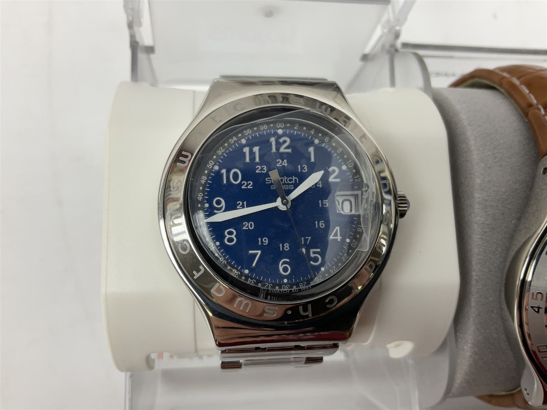 Swatch Irony chronograph stainless steel quartz wristwatch, on original tan leather strap and one other Irony quartz wristwatch, on stainless steel strap both boxed (2)