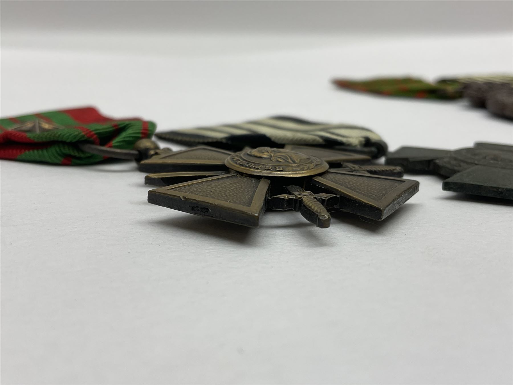 Four French medals - St. Helena medal with bust of Napoleon to obverse and inscription to reverse 'Campagnes de 1792 a 1815. A ses compagnons de gloire sa derniere pensée Ste. Hélène 5 Mai 1821', established by Emperor Napoleon III in 1857; two WW2 Croix-de-Guerre; and WW2 Croix-du-Combattant; all with ribbons (4)