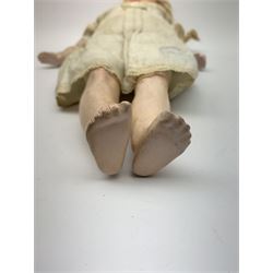 Early 20th century Cuno and Otto Dressel wax shoulder head doll with applied hair and fixed glass eyes, soft body with jointed composition lower limbs, maker's stamp to right thigh, clothing and box H38cm in original box