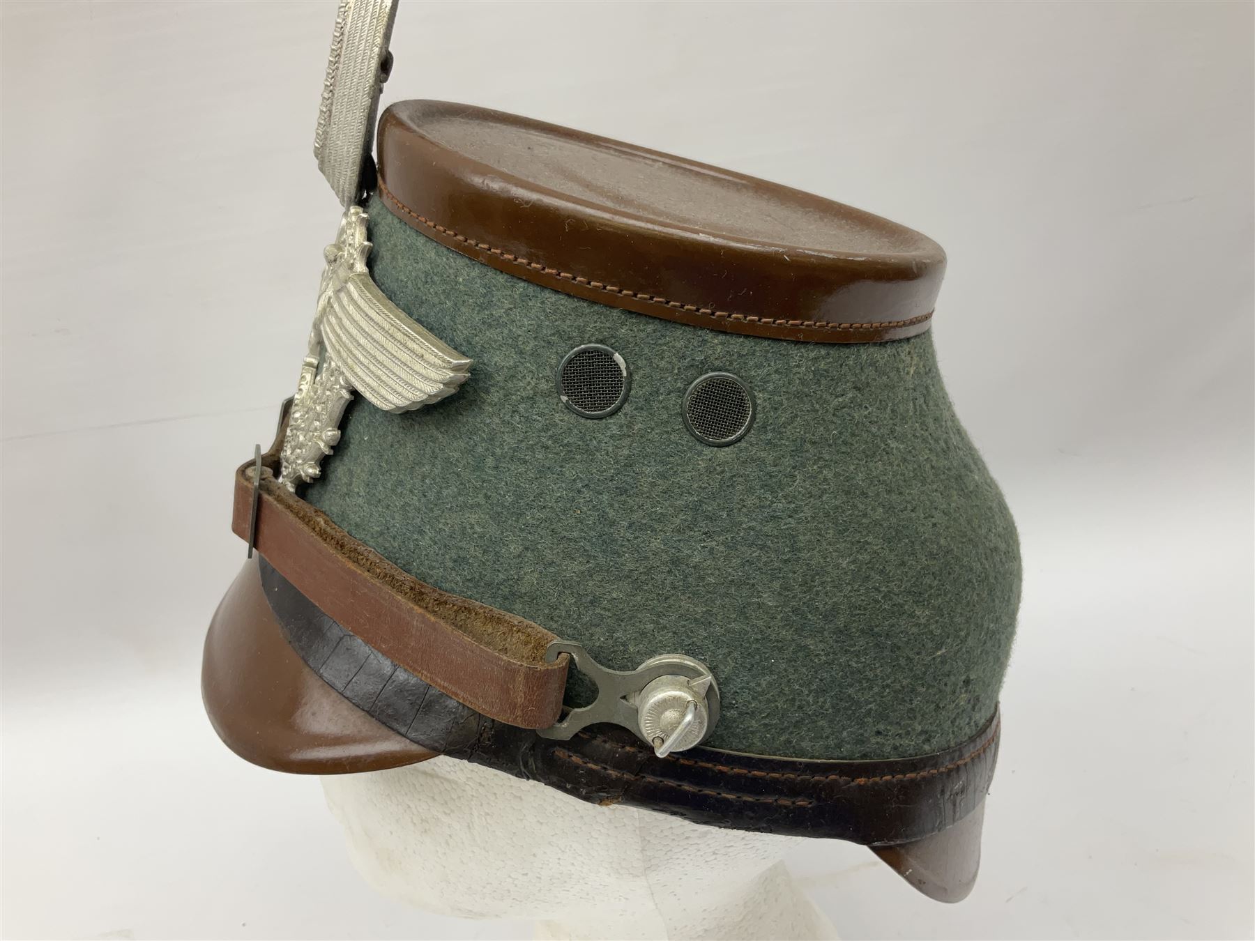 WW2 German rural police shako with helmet plate and liner; bears label 'Hans Romer Echt Fiber-Tschako Neu-Ulm (Donau)'