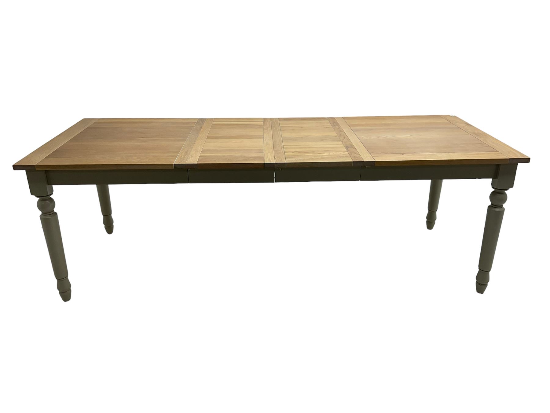 Neptune Furniture - 'Suffolk' oak dining table, pull-out extending top with two additional leaves, on turned supports, in grey paint and wax finish 