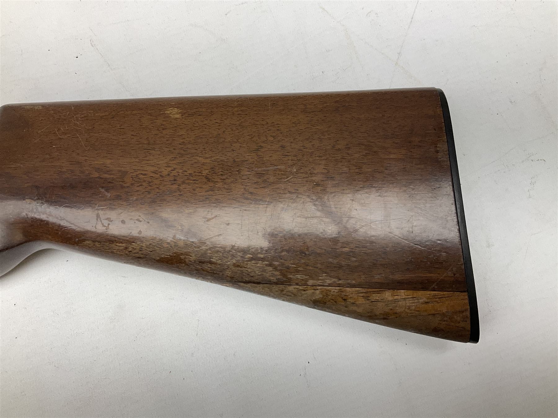 Winchester Japan 5500 12-bore by two-and-three quarters over-and-under double barrel boxlock ejector sporting gun, with 71cm barrels, ventilated rib and barrels, the walnut stock with chequered pistol grip and fore-end, single selective trigger and top safety, serial no.K542927E, L115cm overall; in gun sling SHOTGUN CERTIFICATE REQUIRED