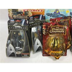 Seventeen TV & film related carded action figures comprising four Pirates of the Caribbean; five Shrek; three Star Trek; two Sea Quest DSV; Captain Scarlet, Warriors of Virtue; and Jurassic World; all in unopened blister packs (17)