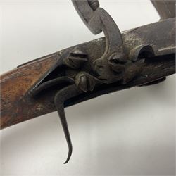 Late 18th/early 19th century flintlock tinder lighter, the steel box lock with hinged door to the left side, elm butt with plain bar trigger, the left side set with a candle sconce and bipod front support, L16cm.