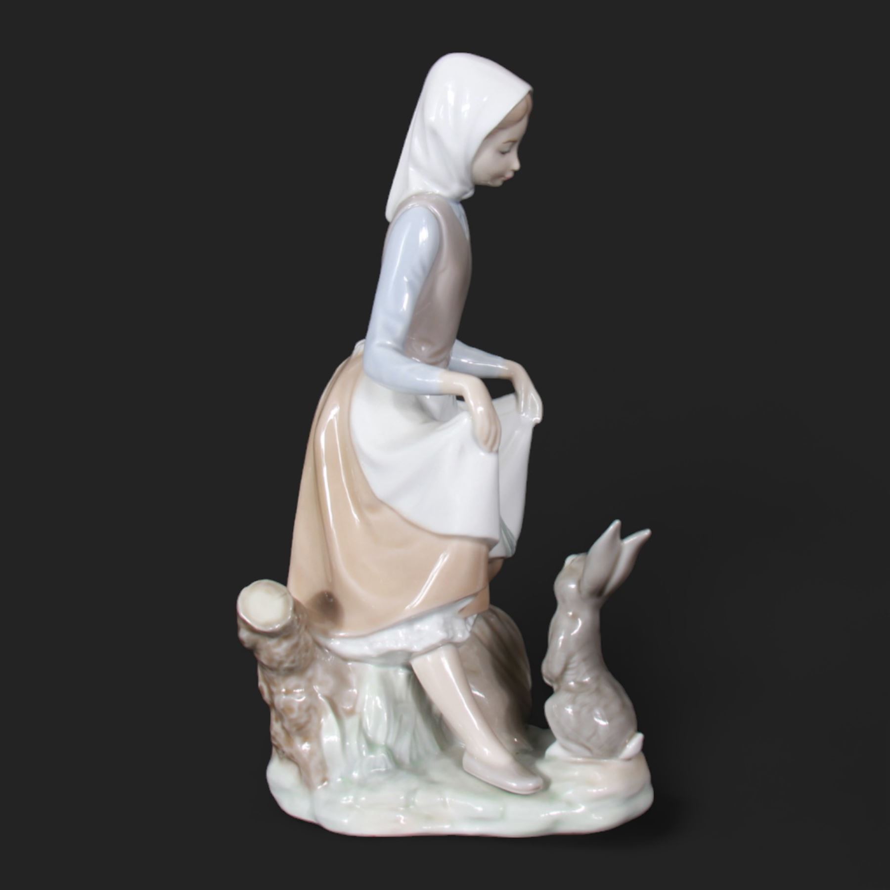 Five Lladro figures, including Dutch Girl with Duck no 5066, Girl With Cockerel no 4591, Rabbit Food no 4826 etc 